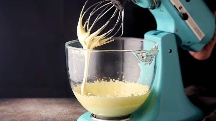Whipped yolks and sugar, dropping from the whisk in a long, thick ribbon.
