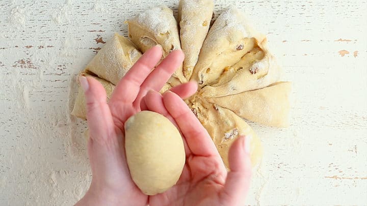 Shaping the dough into buns.
