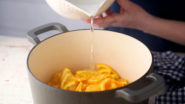 Soaking oranges in water overnight to draw out the natural pectin.