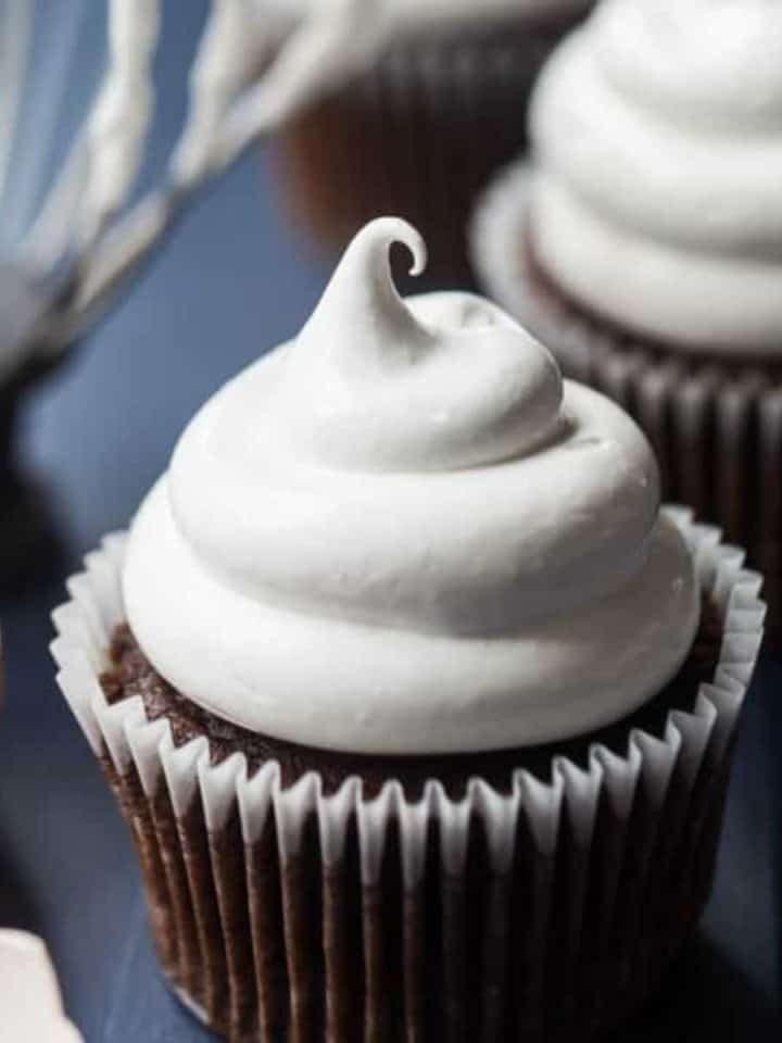 Chocolate cupcake topped with marshmallow frosting.