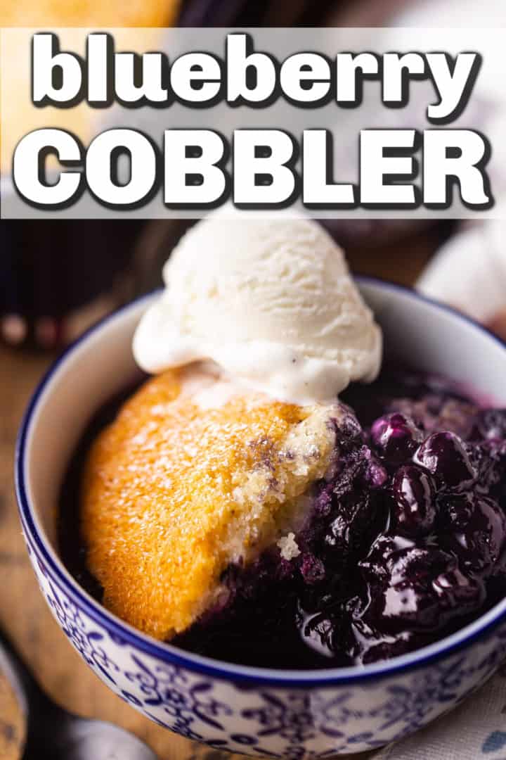 Vertical close-up image of a bowl of blueberry cobbler with vanilla ice cream, with a text banner above that reads "Blueberry Cobbler."
