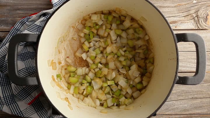 Cooked celery and onions in a large pot.