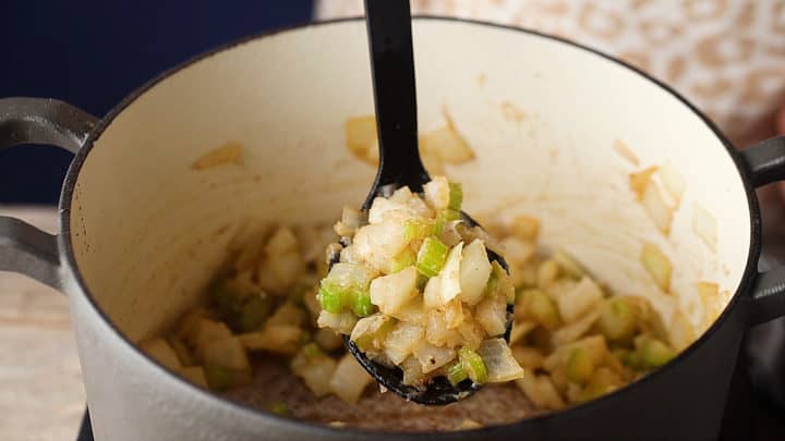 Celery and onions coated in roux.