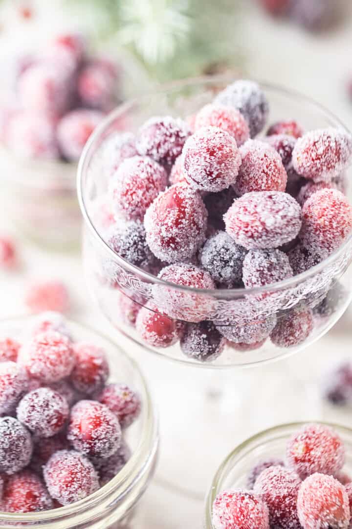 Close-up image of sugar coated cranberries in a champagne glass.