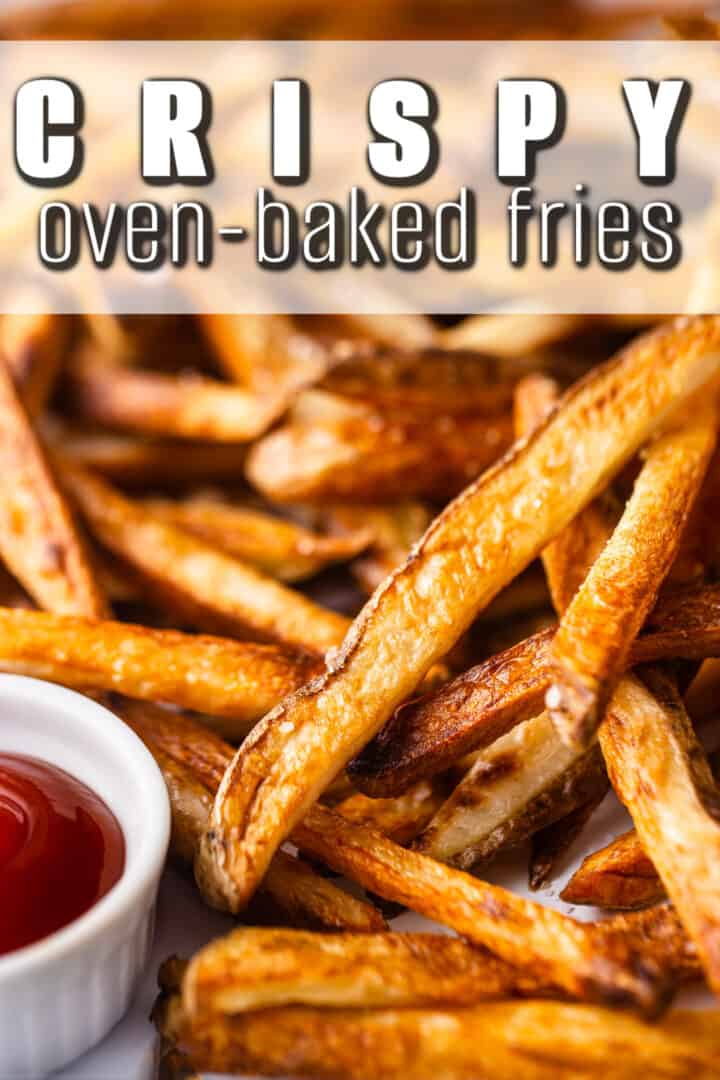 Extreme close up of oven fries recipe, baked and served with ketchup for dipping.