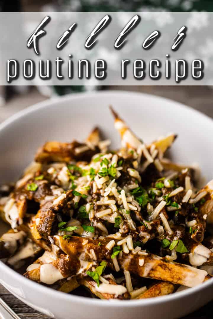 Poutine recipe made with oven fries, beef gravy, and cheese, garnished with fresh herbs.