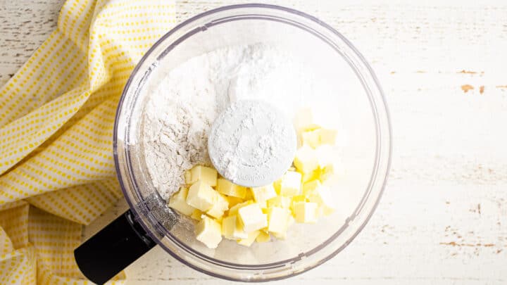 Dry ingredients for tart crust with cold, cubed butter.