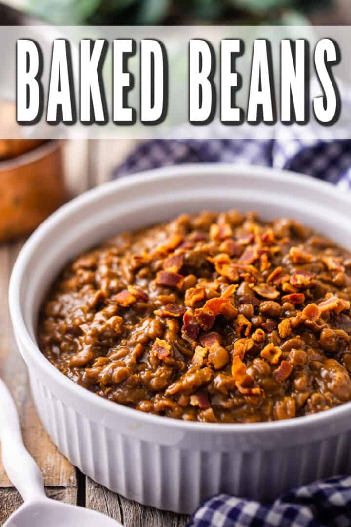 Baked beans recipe, prepared and presented in a round white ceramic serving dish.