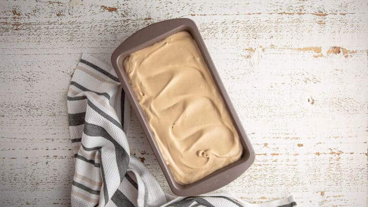 No-churn coffee ice cream base in a loaf pan.