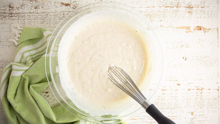 Key lime cake batter in a large glass bowl.
