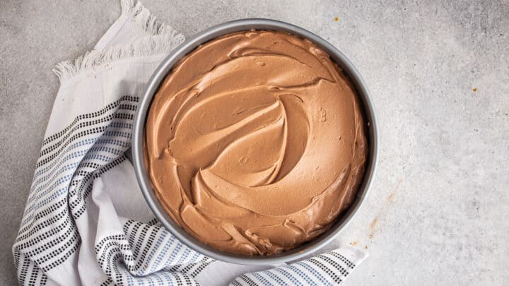 Smooth no-bake chocolate cheesecake before being chilled.