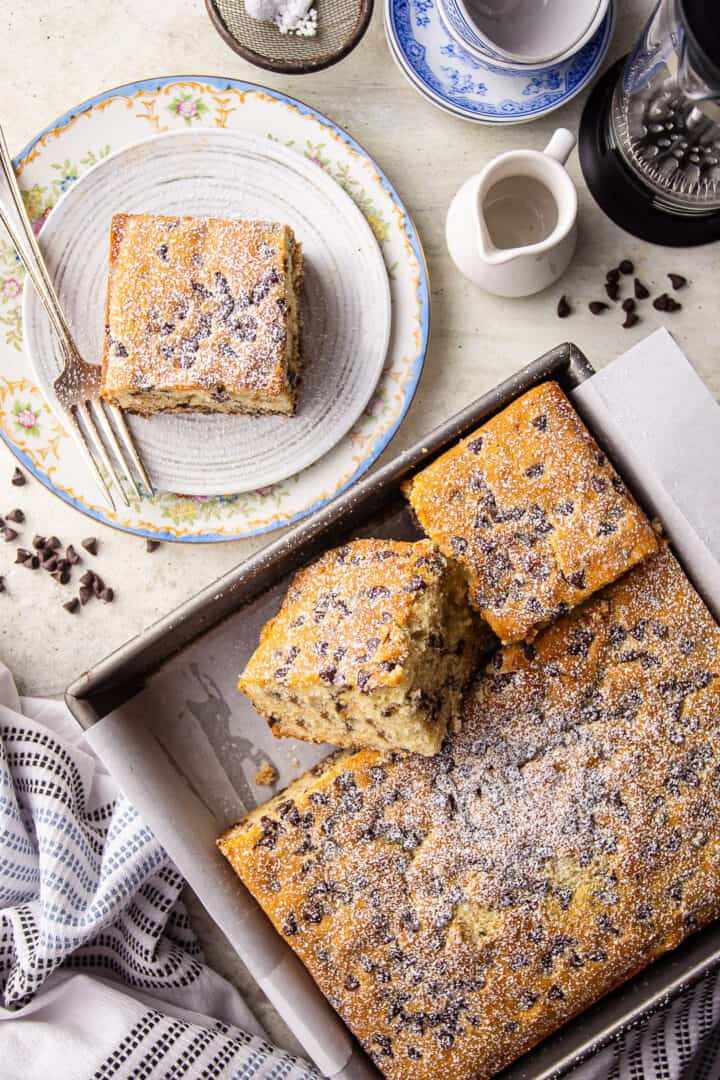 Easy chocolate chip cake recipe, baked and cut into squares.