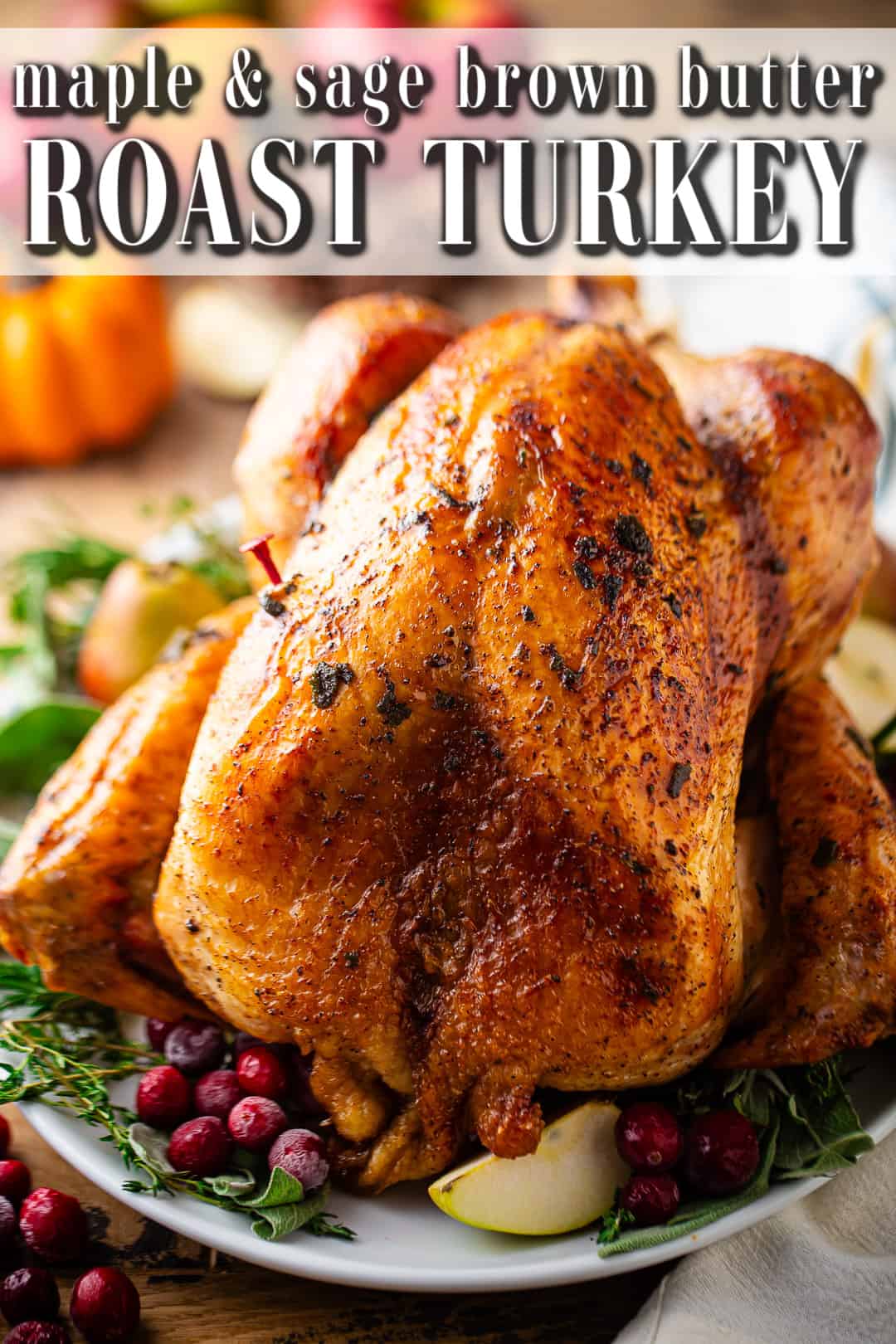 Best turkey recipe prepared and presented on a platter with herbs and seasonal fruits.