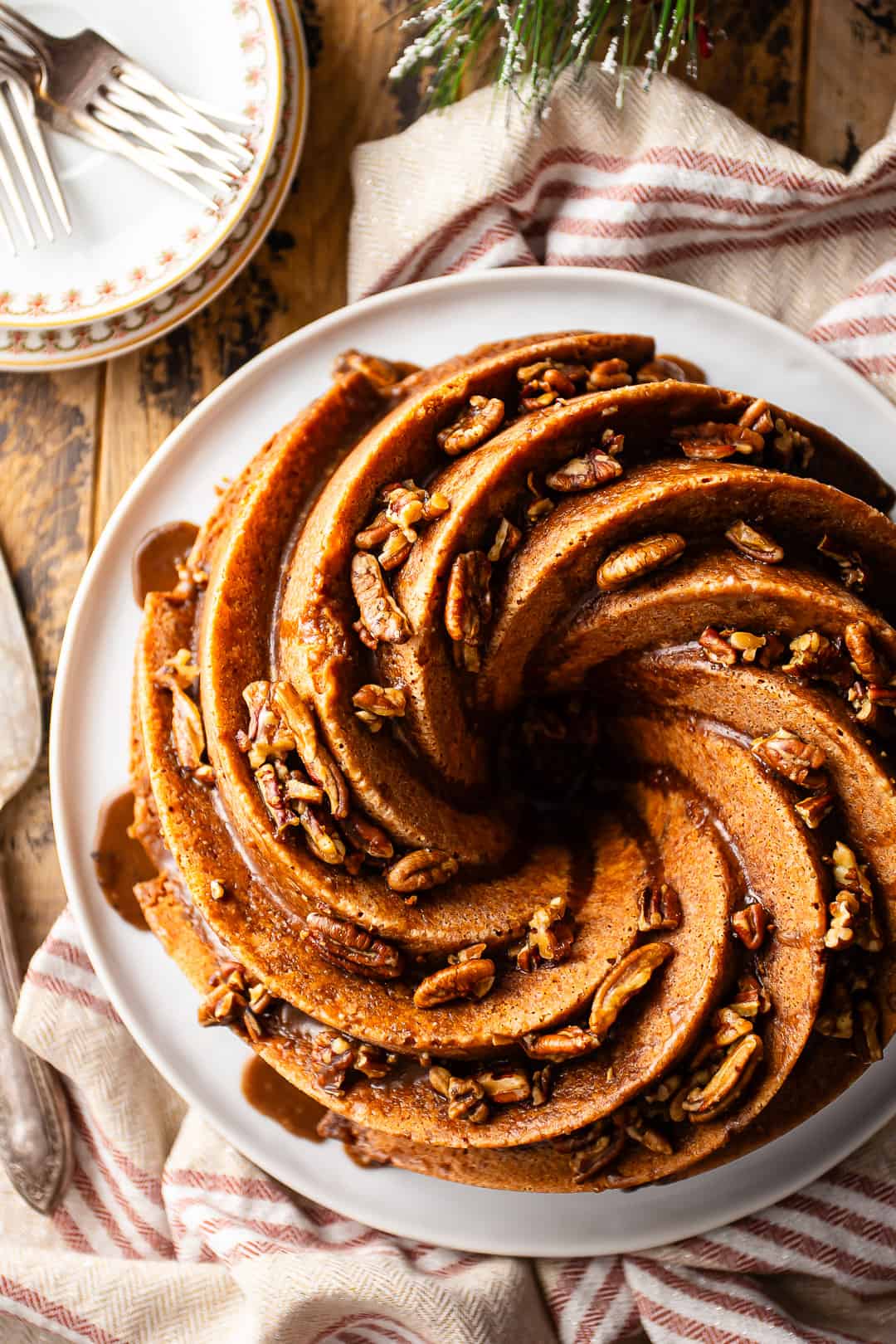 Rum soaked cake, baked in a spiral bundt pan and drenched in a sticky sweet rum glaze.