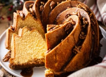 Rum cake drizzled with glaze and toasted pecans.