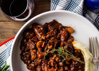 Beef bourguignon, served over mashed potatoes.