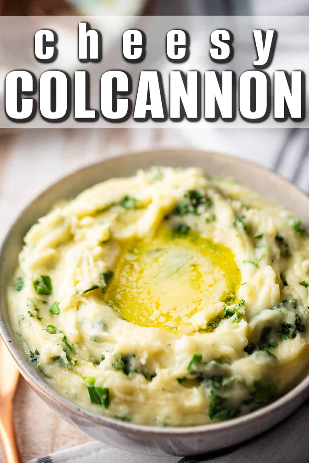 Colcannon recipe with sharp cheddar cheese added.