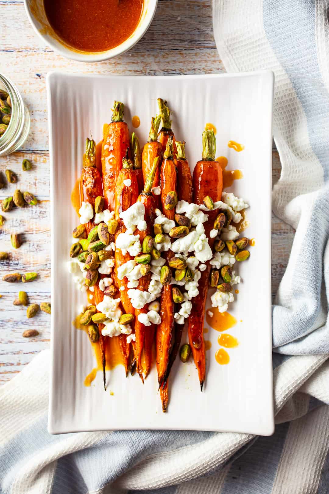 Glazed carrot recipes with orange, goat cheese, and nuts.