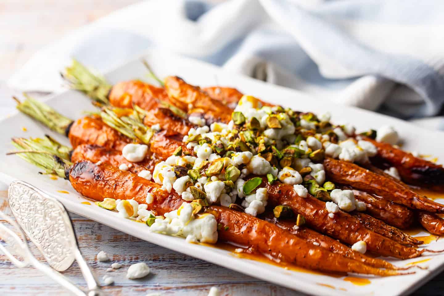 How to make glazed carrots with cheese and nuts.