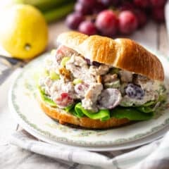 Chicken salad recipe, prepared and served on a split croissant.