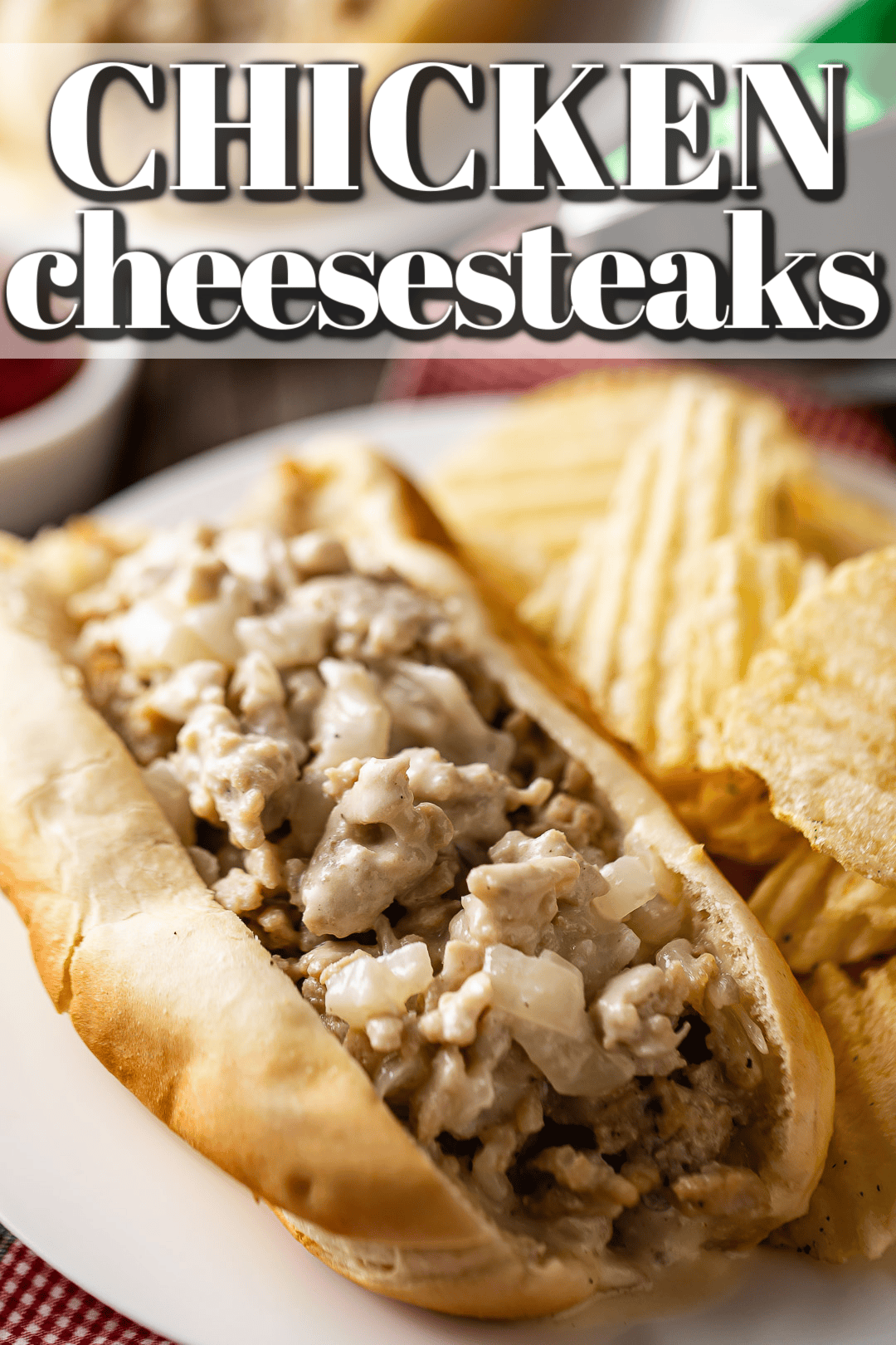 Chicken cheesesteak recipe prepared and served on a log roll with chips.