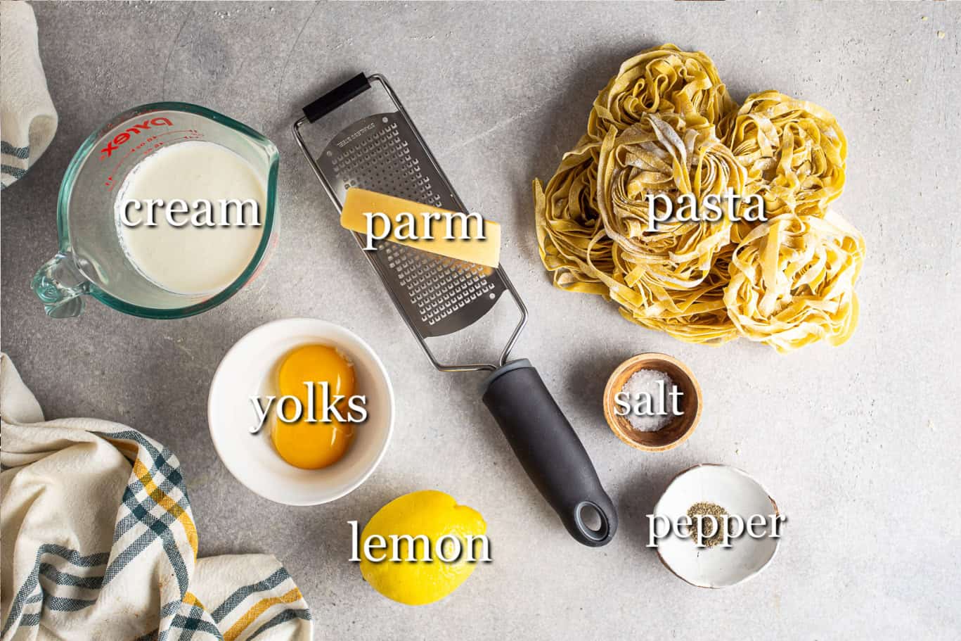 Ingredients for making lemon pasta, with text labels.