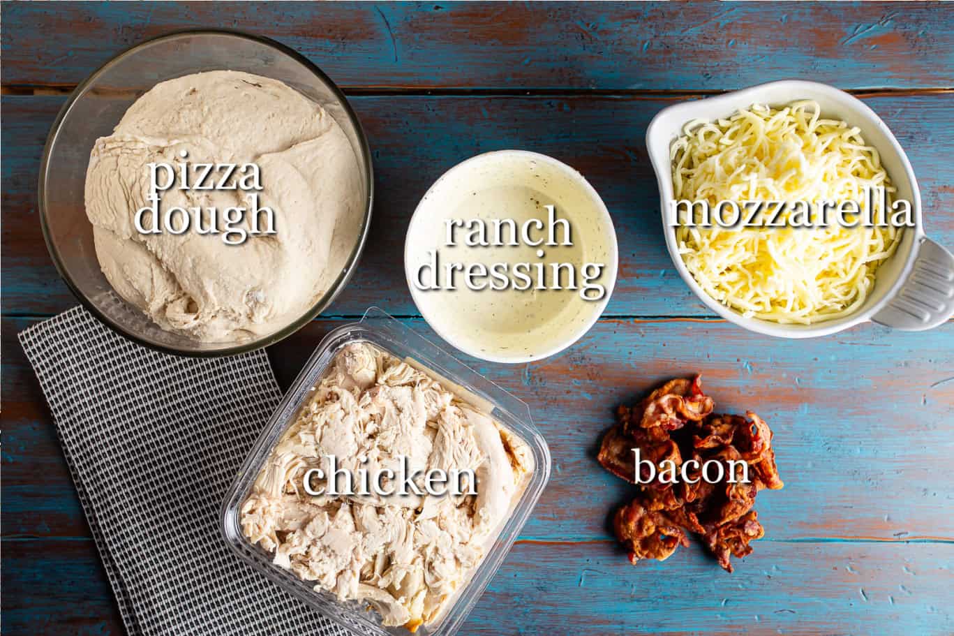 Ingredients for making homemade chicken bacon ranch pizza, with text labels.