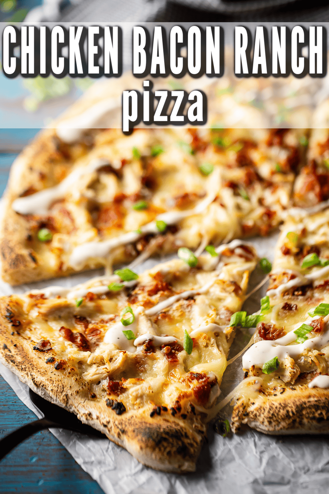 Chicken bacon ranch pizza recipe, prepared and garnished with sliced green onions.