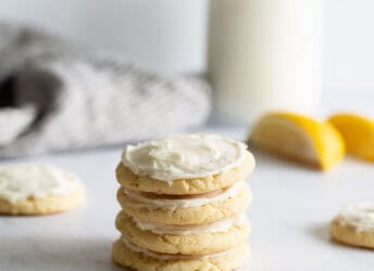 Lemon cookies stacked on top of each other.