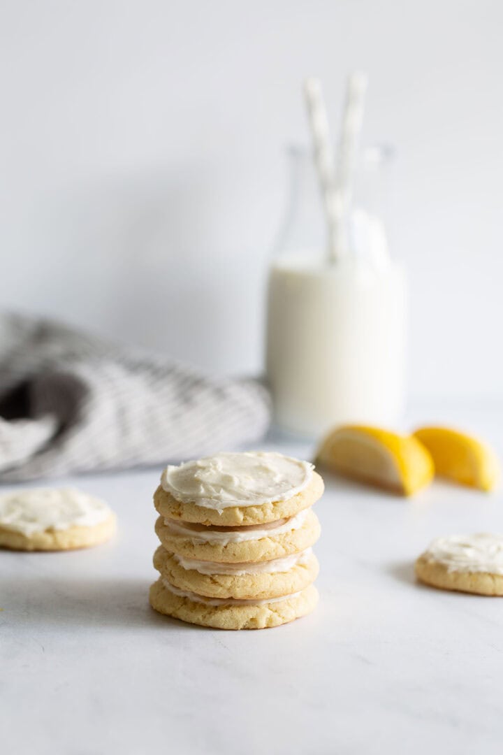 Lemon cookies stacked on top of one another.