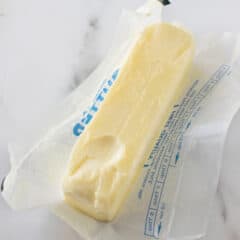 softened butter sitting in butter wrapper.