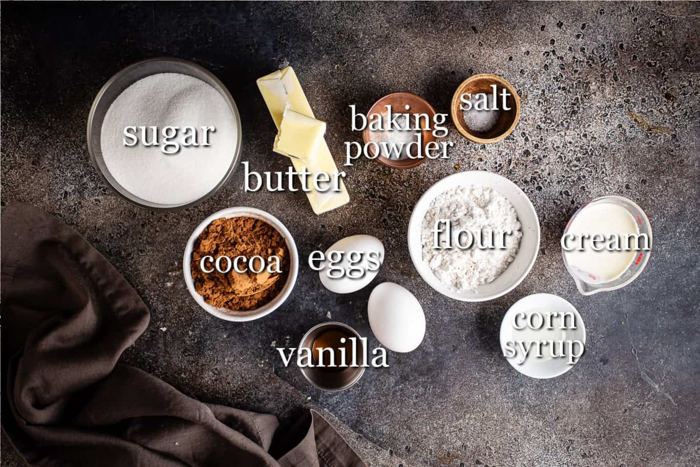 Ingredients for making salted caramel brownies, with text labels.