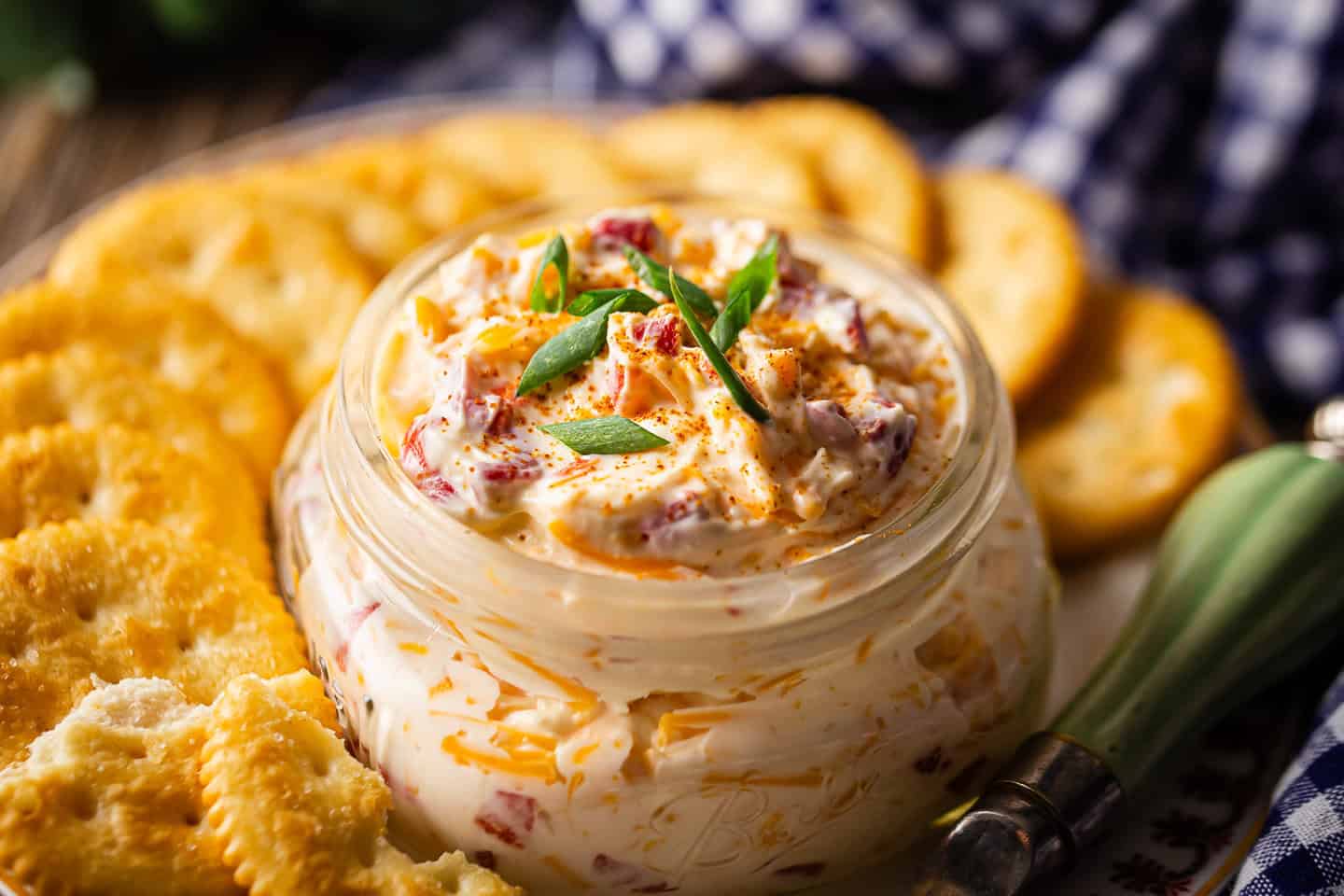 How to make pimento cheese in 2 easy steps, served with crackers or as a topping on sandwiches or a hot dip.