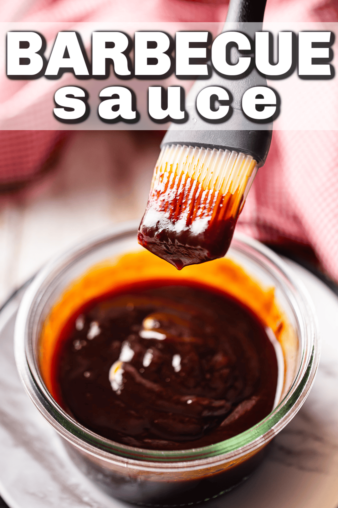 Barbecue sauce recipe prepared and being picked up on a sauce brush.