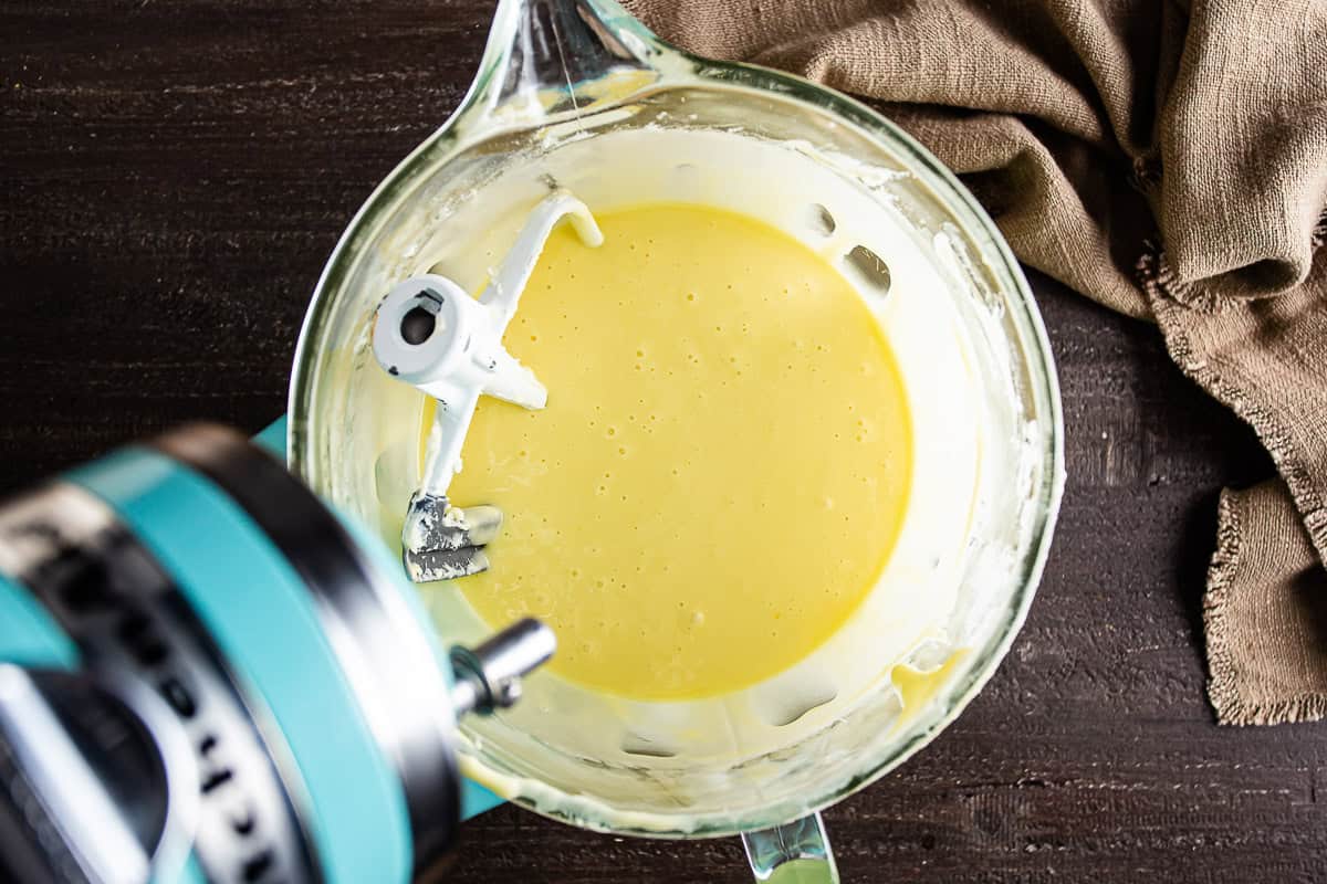 Eggs after being added to the Basque cheesecake batter.