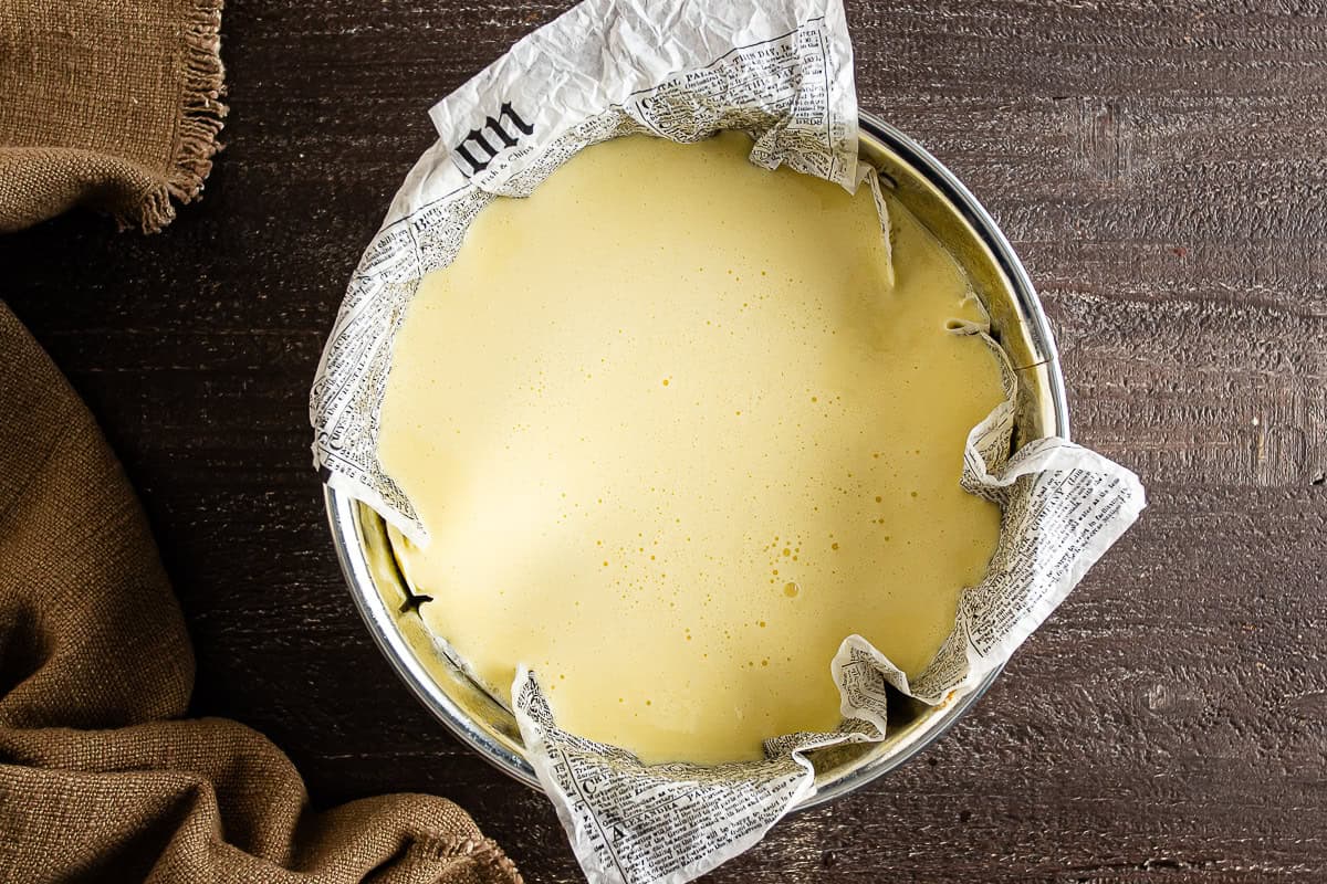 Basque cheesecake batter before being baked, poured into the prepared springform pan.
