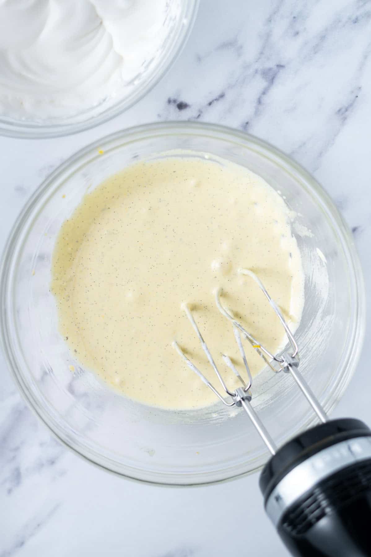 egg yolks and sugar batter mixed together with a hand mixer