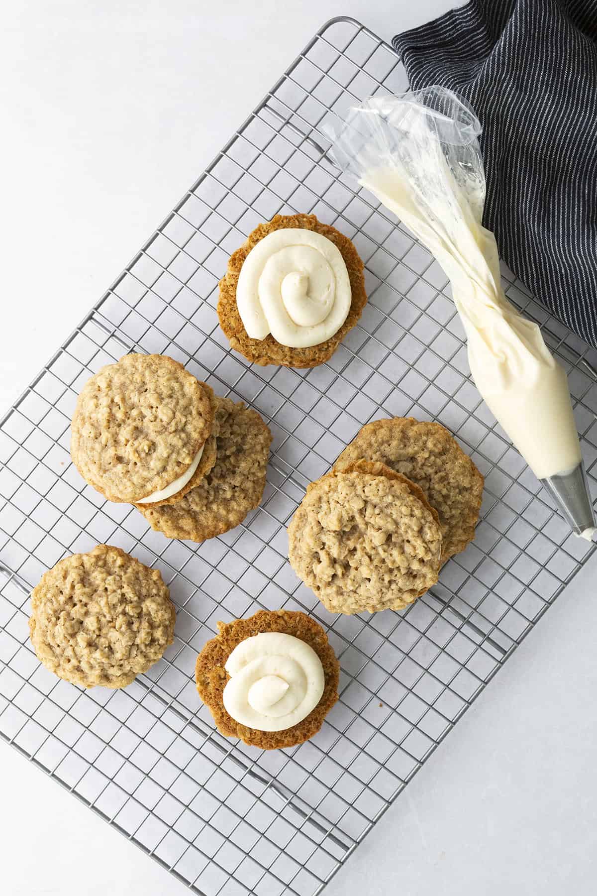 Frosting piped onto cookies