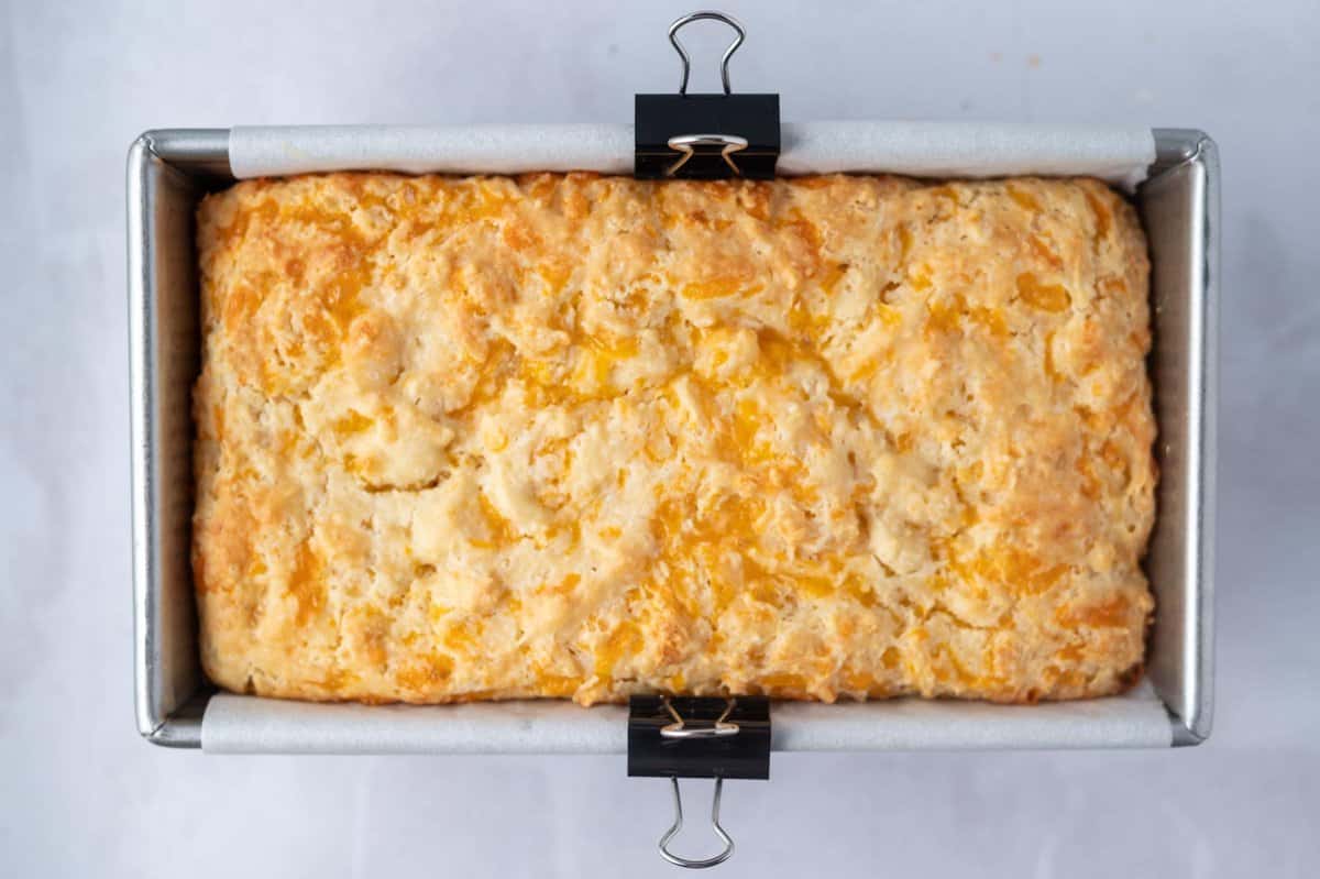 baked cheese bread in a loaf pan