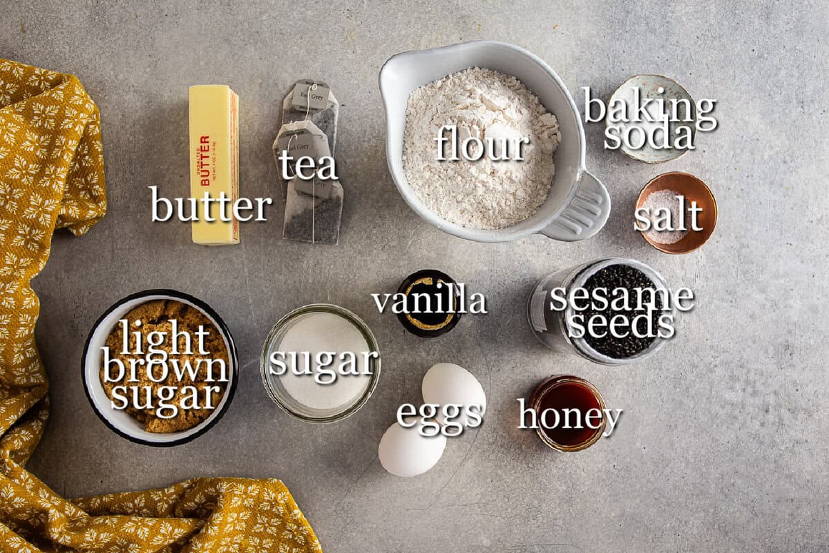 Ingredients for earl gray black sesame cookies in separate containers.