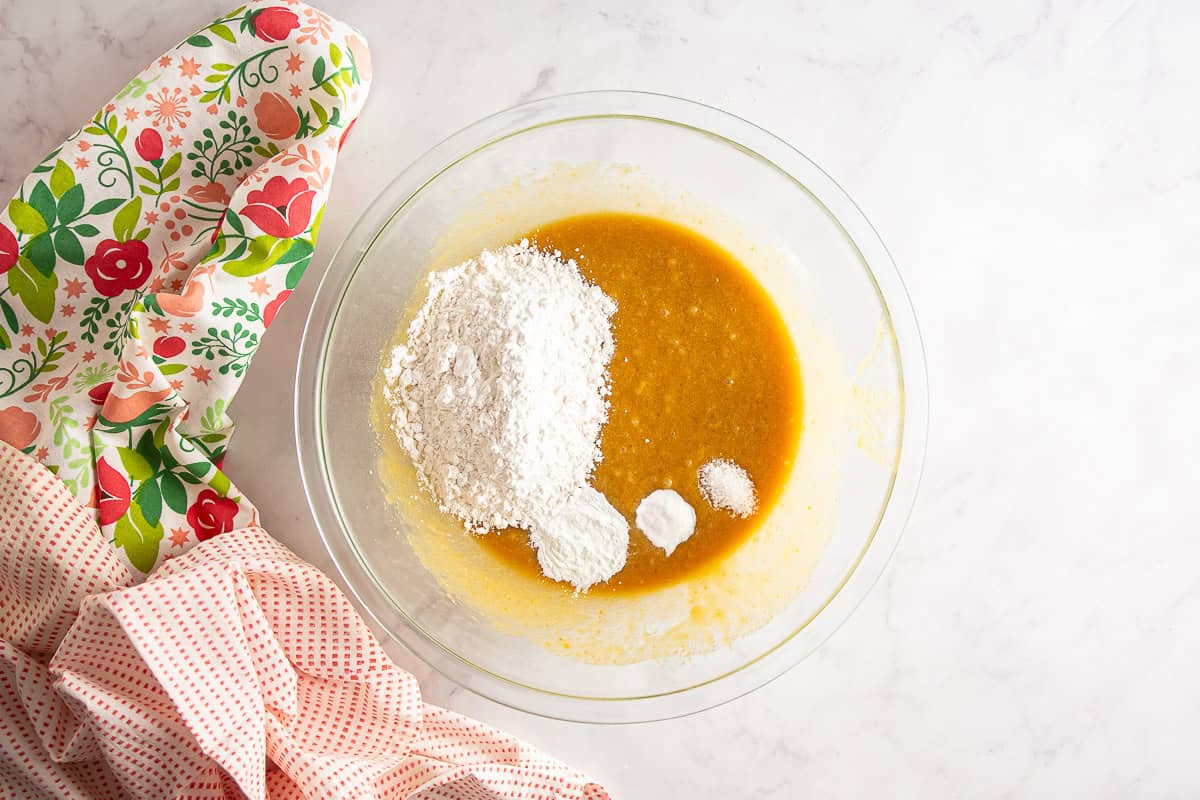 Dry ingredients added to the mixing bowl for berry blondies.