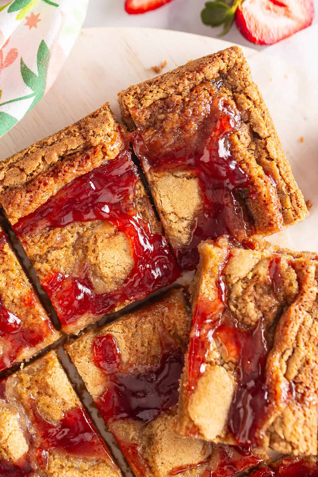 Berry Blondies cut into squares on a serving platter.