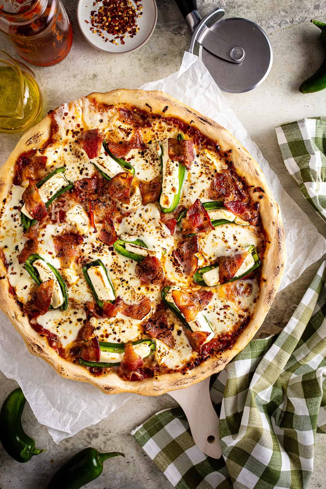 jalapeno popper pizza after being baked but before being cut.