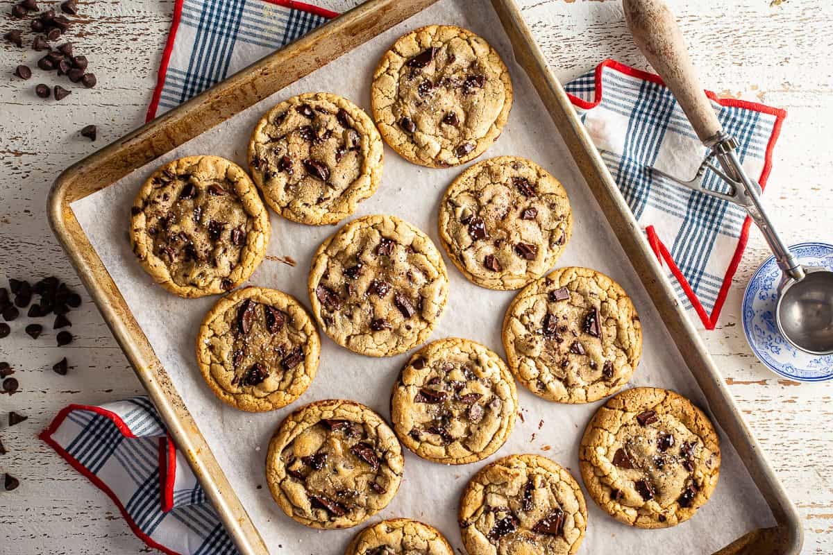 Browned butter cookies after being baked on a prepared cookie sheet.