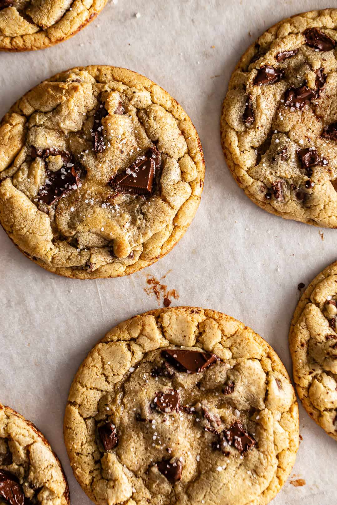 browned butter chocolate chip cookies on a cookie sheet.