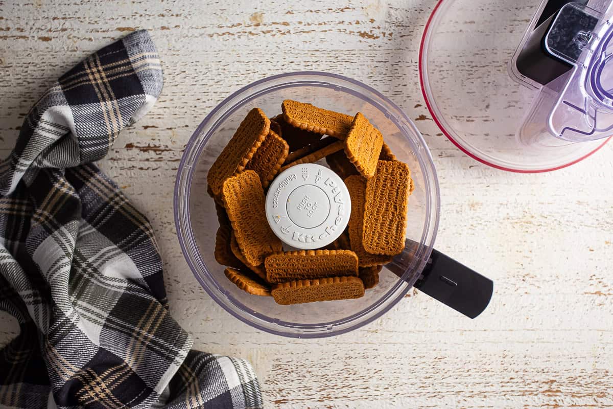 Biscoff cookies in a food processor before being processed.