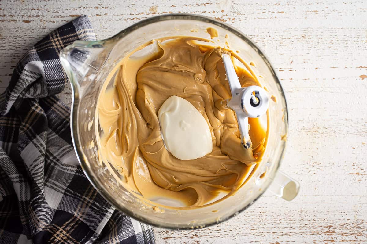 Cream being added to the Biscoff cheesecake batter.