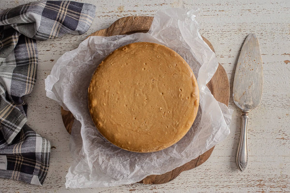 Baked Biscoff cheesecake after being removed from the springform pan.