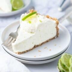 slice of cheesecake on a plate with a fork and text overlay