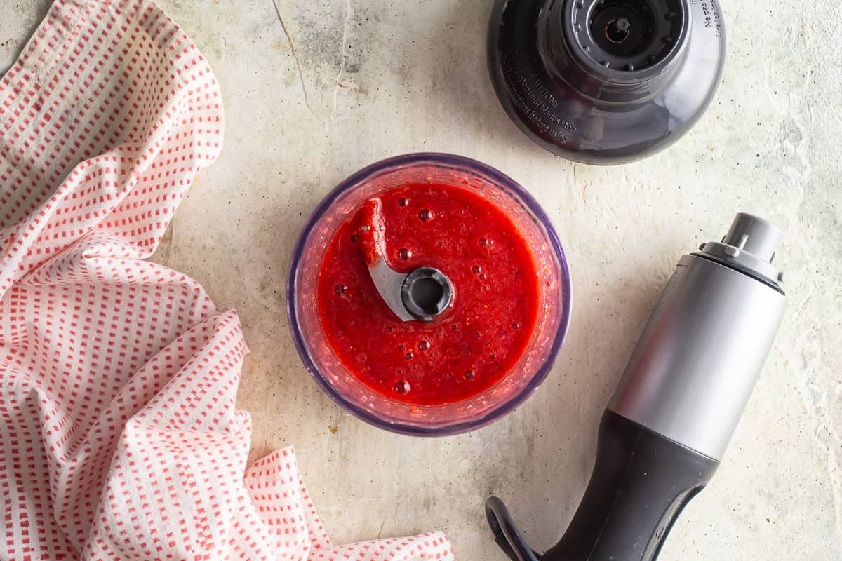 Strawberries and sugar blended for an iced matcha latte.
